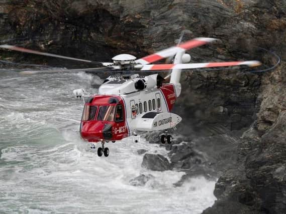 A coastguard helicopter has been involved in the search. Picture: HM Coastguard