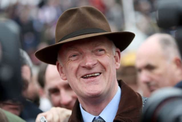 Trainer Willie Mullins celebrates after Yorkhill, ridden by Jockey Ruby Walsh won the JLT Novices' Chase. Picture: David Davies/PA Wire