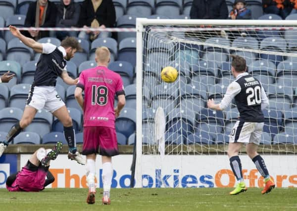 Craig Barr heads home the opening goal from a Chris Johnston free-kick just after the interval.  Picture: Ross Parker/SNS