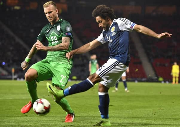 Ikechi Anya almost scored with his first touch against Slovenia. Picture: SNS.