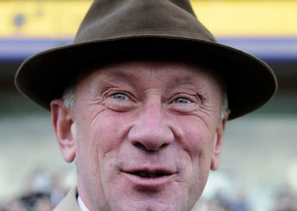 Trainer Nicky Richards saddles Chidswell in the feature at Kelso. Picture: Alan Crowhurst/PA