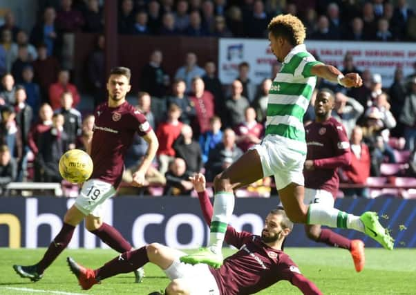 Hearts' Anastasios Avlonitis pokes the ball into his own net but the goal is chalked off. Picture: SNS