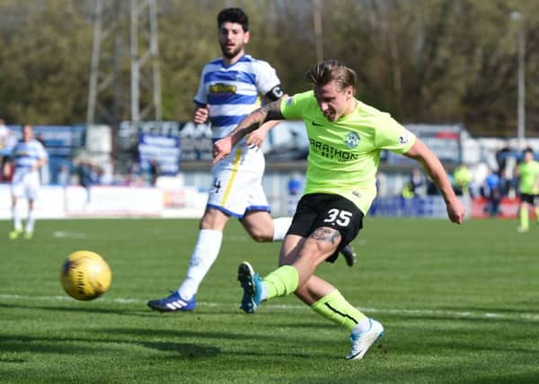 Jason Cummings fires Hibs aheadat Cappielow on Saturday. Picture: SNS