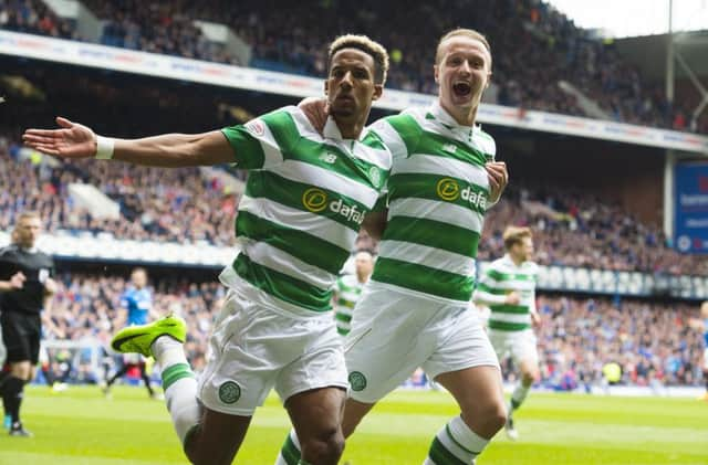 Scott Sinclair celebrates with Leigh Griffiths after he scores a penalty for his side. Pic: SNS/Paul Devlin