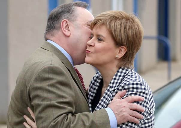 SNP leader Nicola Sturgeon with Gordon candidate Alex Salmond during a visit to to the Dreams Daycare nursery in Insch. Picture: PA