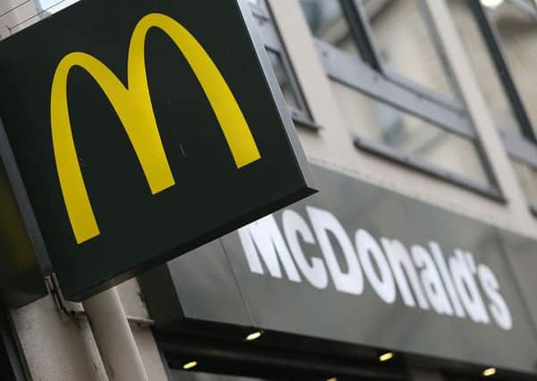 Michael and Ross Dunlop signed in a local McDonald's. Picture: AFP/Getty