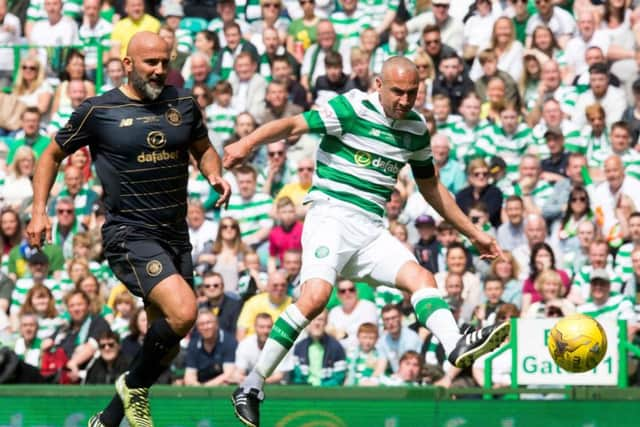 Henrik Larsson and Enrico Annoni (left) during the charity match at Celtic Park. Picture: PA