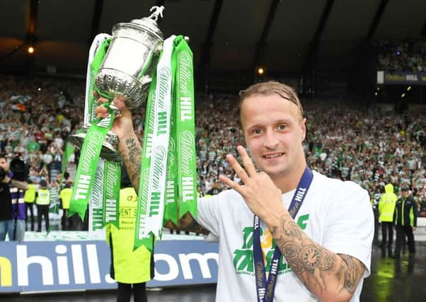 Leigh Griffiths celebrates Celtics treble in front of the jubilant fans at Hampden Park on Saturday. Picture: Alan Harvey/SNS