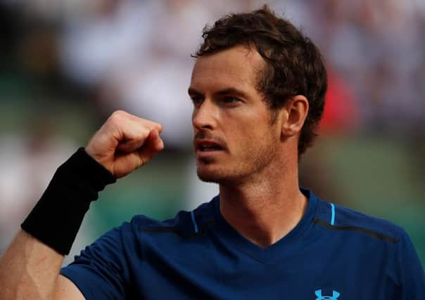 Andy Murray celebrates  during his first-round win over Andrey Kuznetsov at the French Open at Roland Garros. Picture: Clive Brunskill/Getty Images