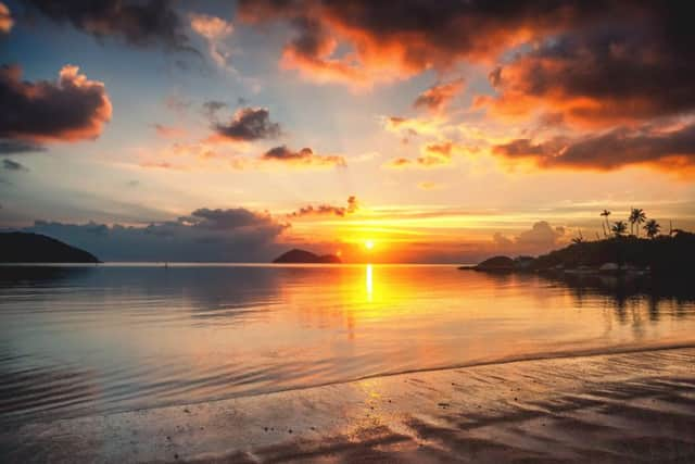 Beautiful sunset on the tropical beach
Ko Samui

 Full Moon Party. Started as a
small beach celebration on nearby
Ko Pha Ngan