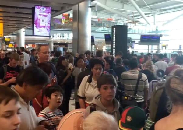 Passengers queuing at Heathrow airport terminal 5, after British Airways cancelled all flights from Gatwick and Heathrow as computer problems caused disruption worldwide. Picture: Emily Wilson/PA Wire