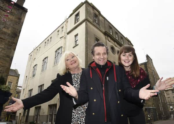 Peter Schaufuss, centre, and Karen Koren, left, in front of the new Rose Theatre, which will be a venue at this years Fringe. Picture: Greg Macvean