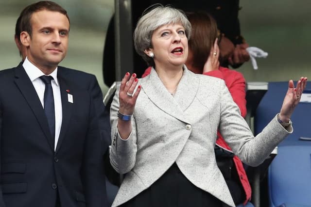 Theresa May mocked for awkward Mexican wave at England match