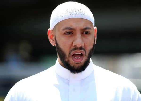 Mohammed Mahmoud, an Imam at Finsbury Park Mosque, gives a statement to the media at a police cordon following the attack. Picture; PA