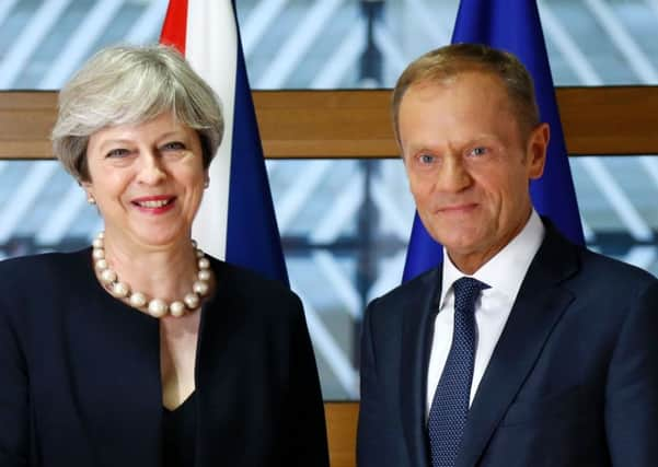 British Prime Minister Theresa May and European Council President Donald Tusk pose during a EU leaders summit in Brussels. Picture; Getty