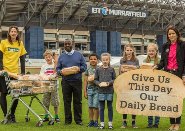 Lynne Paterson, Vincent Moyo and Libby Talbot, minister of St Pauls and St Georges Church, Edinburgh, launch the Renew Our World campaign with young helpers. Photograph: Chris Hoskins