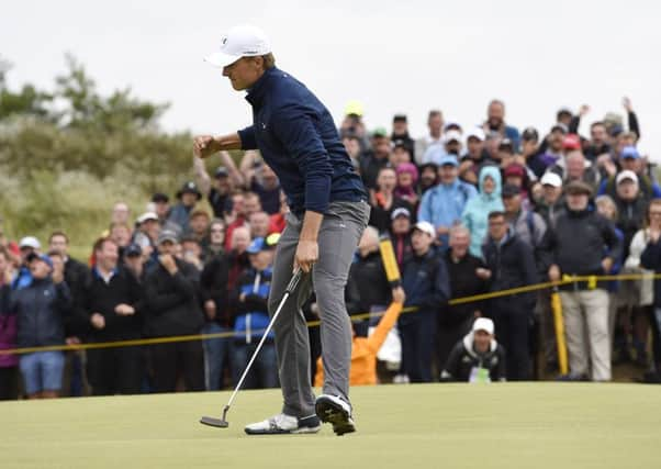 Jordan Spieth celebrates on the 16th after holing his birdie putt. Picture Ian Rutherford