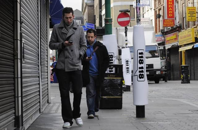 Honolulu has banned texting while crossing the road to prevent injuries. Picture: Micha Theiner/Getty Images