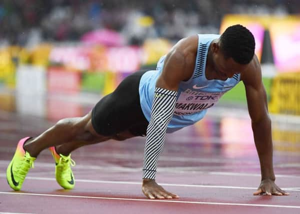 Isaac Makwalas push-ups at the end of his time trial sprint were designed to show how fit he felt. Photograph: Jewel Samad/Getty Images