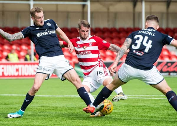 Hamilton's David Templeton  is brought down in the box and the penalty is awarded. Picture: SNS/Ross Parker