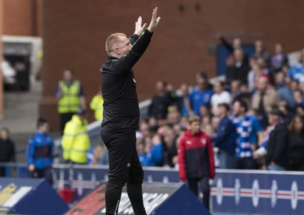 Hibernian head coach Neil Lennon celebrates his side's equaliser. Picture: SNS