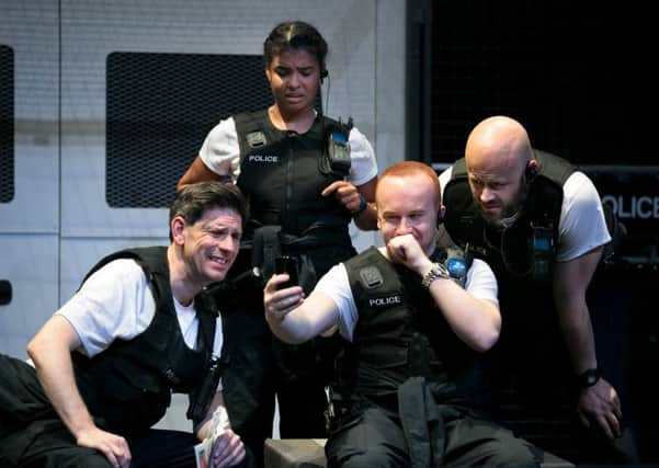 Four police officers in a van create a mood of fear and disillusion that says much about the future of the service. Picture: Eoin Carey