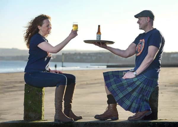 Bellfield marketing manager Anna Orr with brewer Kieran Middleton. Picture: Neil Hanna