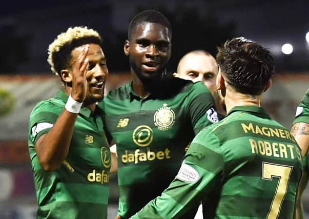 Celtic's Scott Sinclair, left, celebrates his second goal with Odsonne Edouard and Patrick Roberts. Picture: SNS