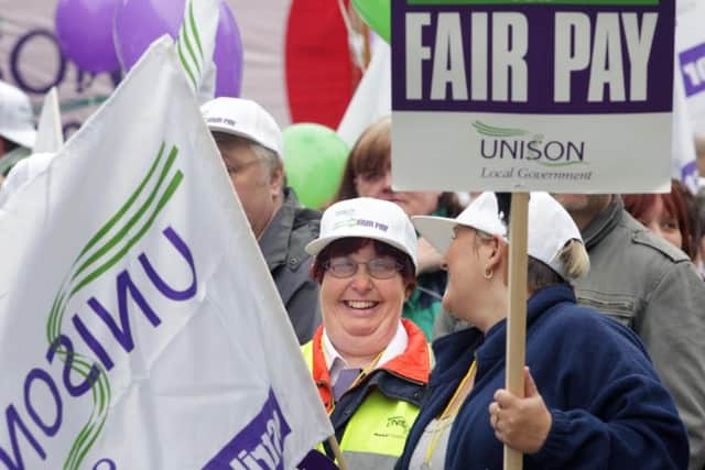 Striking local authority staff march through Edinburgh in 2008, but union membership continues to decline across Scotland. Picture: PA