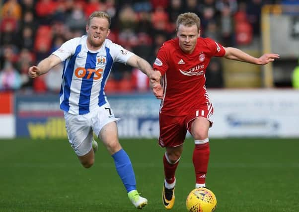 Kilmarnocks Rory McKenzie tries to keep pace with Aberdeen winger Gary Mackay-Steven. Picture: SNS.