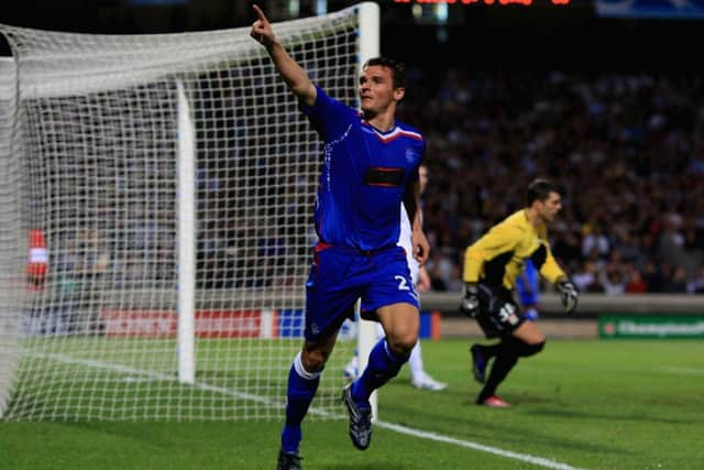 Lee McCulloch salutes the travelling fans after scoring for Rangers in Lyon. Picture:Jamie McDonald/Getty Images