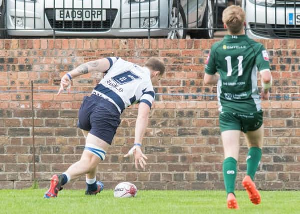 Michael Maltman scores for Heriots after just three minutes to spark the 12-try rout of Hawick.  Photograph: Ian Georgeson