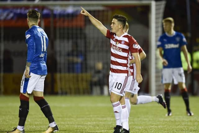 Danny Redmond celebrates scoring the opener. Picture: SNS Group