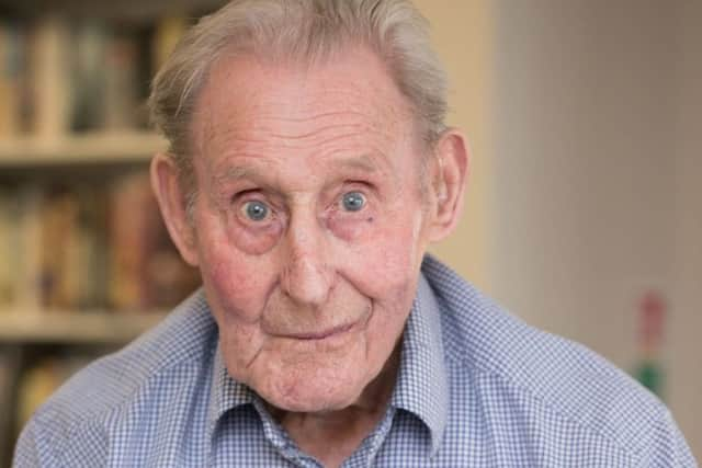 Veteran Ernest Beesley holding his medals while celebrating his 100th birthday. Picture: PA