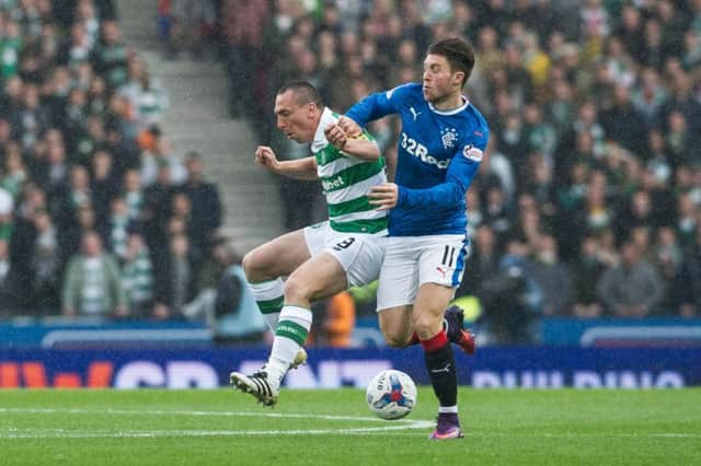 Josh Windass, right, battles with Celtic skipper Scott Brown. Picture: John Devlin