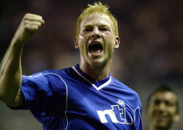 Jorg Albertz celebrates a goal for Rangers at Ibrox against Austrian side Sturm Graz in September 2000. Picture: PA