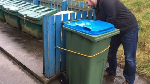 Gone with the wind? Islanders are shown video on how to put out bins