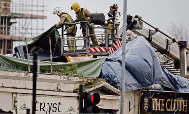 10 people died after a police helicopter crashed through the roof of a busy pub in Glasgow on 29 November 2013. Picture:
Jeff J Mitchell/Getty