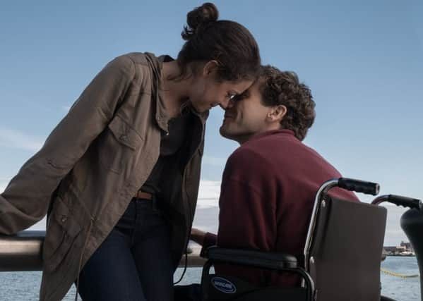 Jake Gyllenhaal and Tatiana Maslany in Stronger