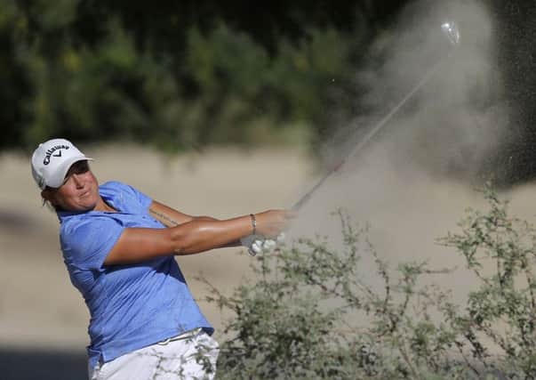 Michele Thomson plays a shot on the 14th during the second round of Dubai Ladies Classic. Picture: Kamran Jebreili/AP
