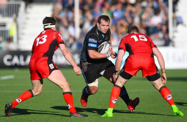 Action from the last 1872 Cup clash as Fraser Brown faces up to Chris Dean and Glenn Bryce of Edinburgh. Picture: SNS Group