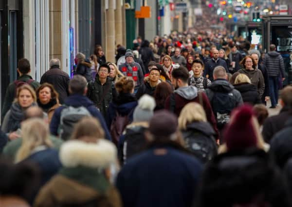 Shoppers on Princes Street, Edinburgh, on Friday.