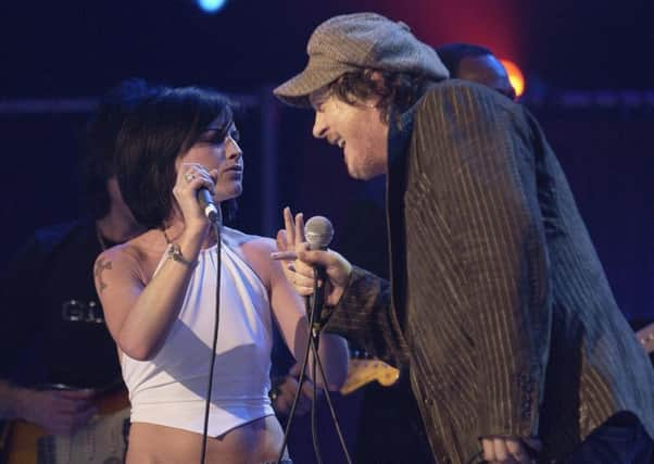 Dolores O'Riordan joining Italian singer Zucchero onstage during a benefit show at the Royal Albert Hall. Picture: Yui Mok/PA Wire