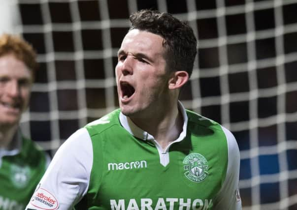 John McGinn celebrates after putting Hibs 1-0 up. Picture: SNS