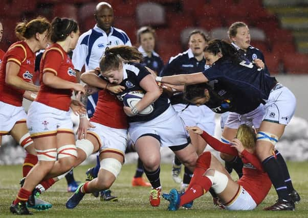 24/02/17 RBS WOMEN'S SIX NATIONS 
 SCOTLAND WOMEN V WALES WOMEN (15-14) 
 BROADWOOD STADIUM - CUMBERNAULD 
 Scotland's Jade Konkel is tackled by Wales Sioned Harries