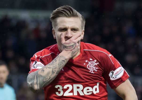 Rangers' Jason Cummings celebrates after scoring to make it 2-0. Picture: SNS