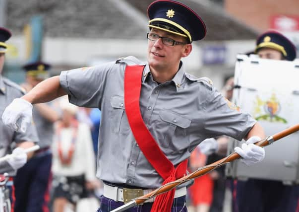 A marcher takes part in the annual County Grand Orange Order Parade in Glasgow. Picture: Jeff J Mitchell/Getty Images