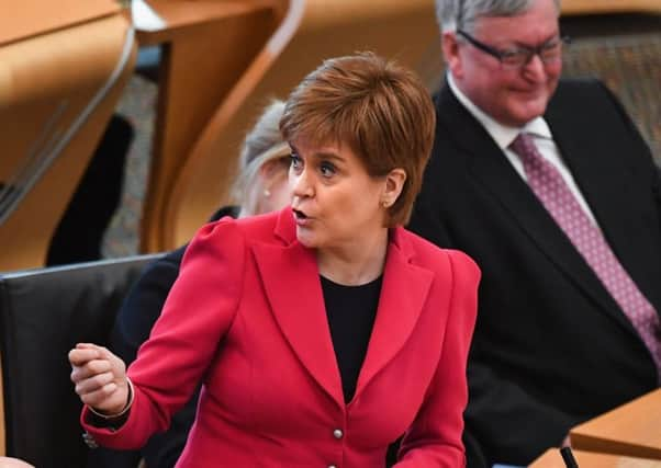 Nicola Sturgeon was grilled by Scottish Greens co-convener Patrick Harvie. Picture: Jeff J Mitchell/Getty Images