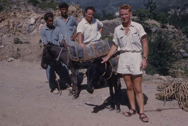 His collection of travel photos is now being lovingly restored.