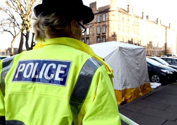 Police in East London Street in Edinburgh's New Town where a homeless man died after a bitterly cold night (Picture: Lisa Ferguson)